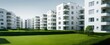 © Thares2020 - Modern white apartment with green grass landscape. Luxury condo design with background. Stylish and sky view