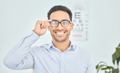 Wall Mural - Happy man, face or glasses for vision, eye exam or optometry in clinic wellness, health or prescription frames. Person, portrait or Mexican patient in optician, ophthalmology and eyesight assessment