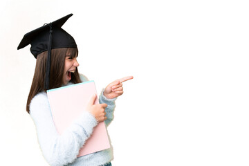 Poster - Little caucasian student girl over isolated background pointing finger to the side and presenting a product