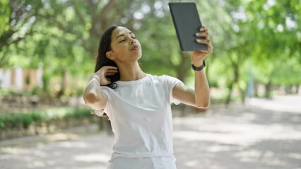 Sticker - African american woman smiling confident making selfie by the touchpad at park