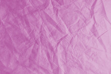 Wrinkled, Crumpled Pink Fabric Texture Background. Wrinkled And Creased Abstract Backdrop Of Spunbond Textile, Wallpaper With Copy Space, Top View.