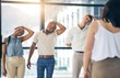 © Charlize Davids/peopleimages.com - Exercise, stretching and a group of business people in the office to workout for health or mobility together. Fitness, wellness and training with an employee team in the workplace for a warm up