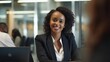 © Fred - Smiling black female lawyer talking to her colleagues