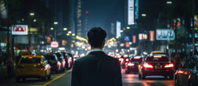 Rear View Of Businessman Walking In The Street Night Time With Blur Motion Car Transportation And Light From Urban City Building Business Motion And City Lifestyle,ai Generate