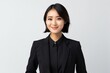 © Eber Braun - Portrait of smiling asian business woman in black suit, isolated on white background