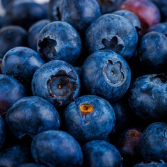 Canvas Print - Vibrant close-up of a collection of ripe blueberries, ready to be enjoyed