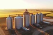 Bird's-eye view of ventilated silos and metal elevator in agricultural area for long-term grain and oilseed storage. Generative AI