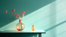 Glass Vase With Pink Blossoms Flowers Twigs On Glass Table Near Empty, Blank Turquoise Wall. Home Interior Background With Copy Space.