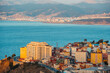 Close view of the Recinto neighborhood in Ceuta and the bay of Morocco in the background at sunrise