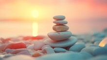 A Stack Of Stones On The Ocean At Sunset. Pyramid Of Pebbles On The Beach. The Concept Of Balance, Harmony, Meditation, Rest Or Seaside Vacation. Illustration For Cover, Card, Interior Design Or Print