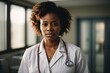 © Alex - Portrait of female African American doctor standing