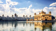 He marveled at the exquisite golden temple, adorned with intricate carvings and designs.