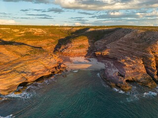 Poster - Aerial view of Pot Alley Beach against the sea at golden hour in Kalbarri, Australia