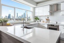Monochromatic Kitchen With Crisp White Walls And Cabinets. White Quartz Countertops, City View From Window