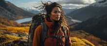 Editorial Heroine Shot Of A Woman Of Color Hiking In An Alpine Mountain Landscape 