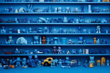 Many Little Blue Objects Arranged Neatly In Rows On Shelves, Collection Of Weird Little Funny Objects, Generative AI