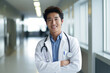 © fahrwasser - Portrait of a smiling young asian doctor in a hospital hallway, generative AI