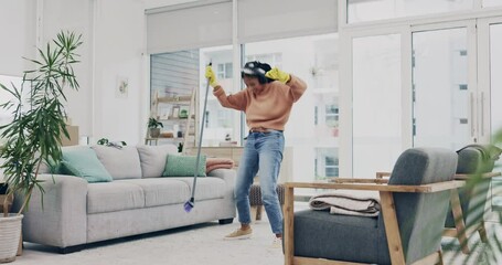 Canvas Print - Cleaning, singer and broom with woman in living room for dance, housekeeping and streaming. Hygiene, dust and karaoke with cleaner listening to headphones at home for sweeping, music and energy