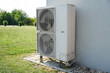Powerful air conditioning or heat pump outdoor unit with two fans, eco green energy house of future concept