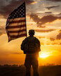 Soldier and USA flag on sunrise background . Veterans Day.