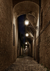 Wall Mural - Forli, Emilia Romagna, Italy: dark alley in the old town