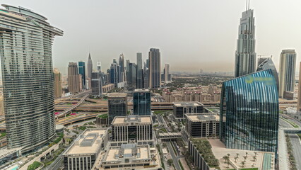 Wall Mural - Pnorama showing futuristic Dubai Downtown and finansial district skyline aerial timelapse.