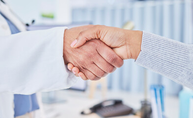 Wall Mural - Healthcare, handshake and woman consulting doctor in a hospital with trust, help and suppport. Health, consultation and patient shaking hands with medic for thank you, gratitude and surgery success