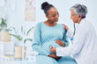 © LuneVA/peopleimages.com - Black woman, pregnant and doctor listening to heart beat in checkup, appointment or visit at hospital. Happy African female person in maternity and mature medical or healthcare professional at clinic