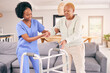 © LuneVA/peopleimages.com - Doctor, senior woman and walking frame for support, healthcare service and helping with balance and disability. Medical physiotherapist, caregiver or nurse with african elderly patient in living room