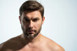 © Volodymyr - Beautiful man with clean perfect skin. Beauty male skin care. Cosmetology cosmetics beauty and spa. Male facial treatment and wellness. Male coscmetic and beauty concept. Face care, male cosmetics.
