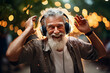 Old man dancing while listening to music in headphones
