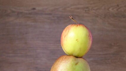 Wall Mural - organic apples rotating. 4k video footage