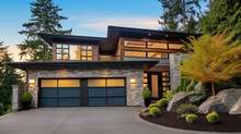 Luxurious New Construction Home In Bellevue, WA. Modern Style Home Boasts Two Car Garage Framed By Blue Siding And Natural Stone Wall Trim.
