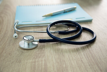 In a hospital setting, the presence of a doctor's physician book and stethoscope carries with it an air of professionalism and dedication to patient care.