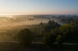 Aerial drone view at sunrise in Poland, landsape with morning fog
