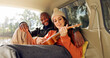 © Felix/peopleimages.com - Singing with Guitar, winter and a couple in a car for a road trip, date or watching the view together. Happy, travel and back of a man and woman with an affection in transport during a holiday or cam