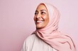 © Leon Waltz - Portrait of happy young muslim woman in hijab smiling at camera