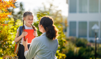 Wall Mural - Parent and kid going to school