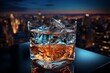 glass of whiskey on the rooftop of a luxury building