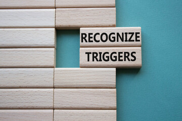 recognize triggers symbol. concept words recognize triggers on wooden blocks. beautiful grey green b