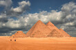 Giza Pyramids on a rare cloudy day - Cairo, Egypt	