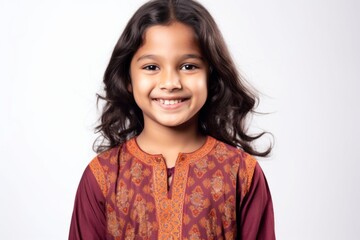 Wall Mural - Group portrait of an Indian child female wearing kurta pajama against a white background