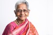 © Eber Braun - Lifestyle portrait of an Indian woman in her 70s wearing traditional sari against a white background