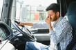 © Serhii - Portrait of tired indian truck driver feeling sleepy and sick