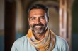 © Eber Braun - Portrait of handsome Indian man smiling at the camera in the mosque