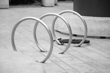 Metal Round Bike Racks With A Single Wheel Attached