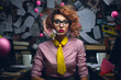 Captivating Portrait of an Eccentric Woman Embracing Her Quirky Side While Working in Her Office