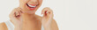 Close-up Beautiful women, polite care, women of beautiful and clean teeth using dental floss.