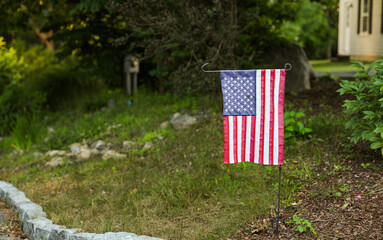 US flag waves proudly, symbolizing unity, freedom, and patriotism, evoking national pride and shared values