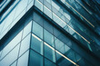 © Elaine - Close-up glass and steel facade modern office building exterior